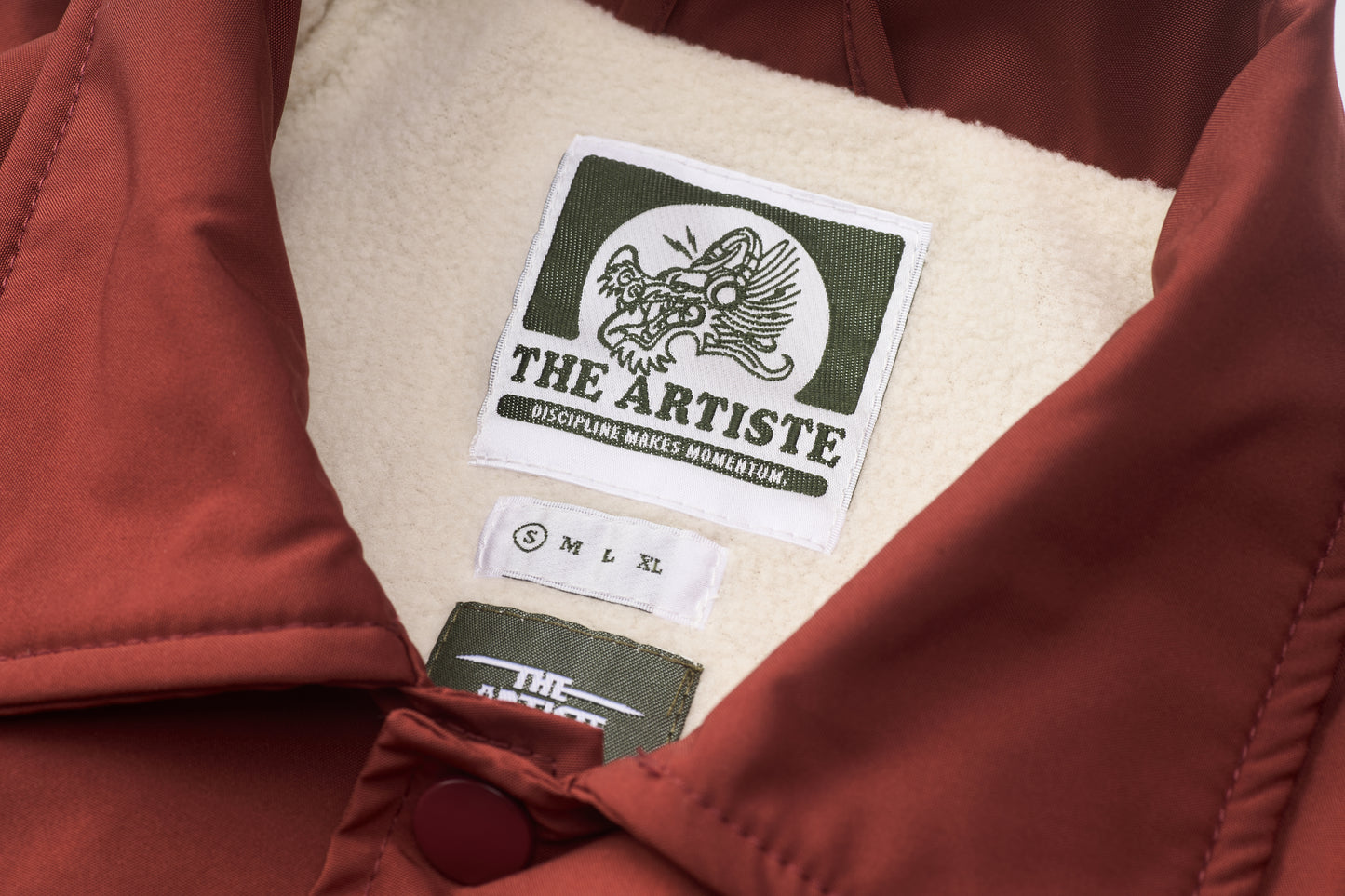 A Classic Coach Jacket Reframed Through THE ARTISTE Lens - RED