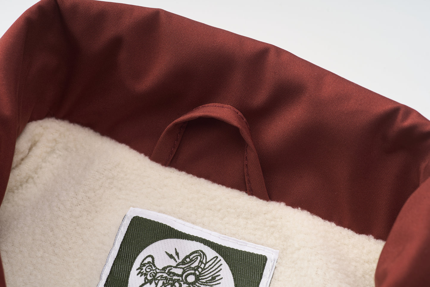 A Classic Coach Jacket Reframed Through THE ARTISTE Lens - RED