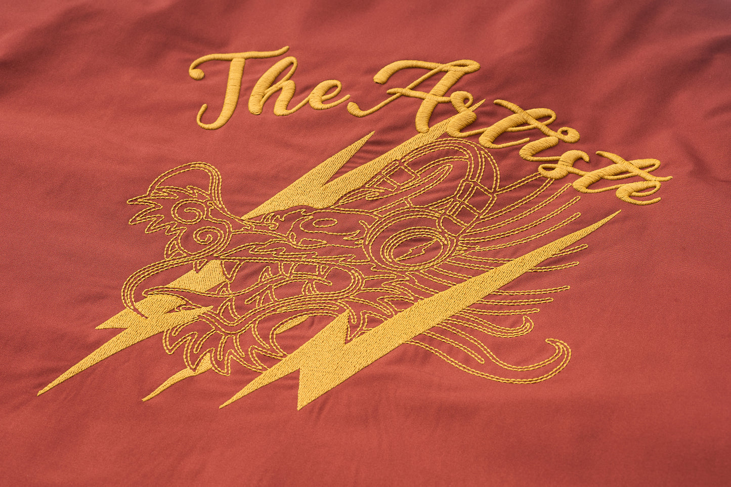 A Classic Coach Jacket Reframed Through THE ARTISTE Lens - RED